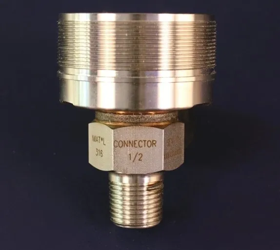 A close up of the connector on a brass pipe